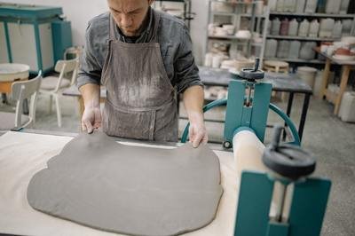 craftsman working with clay