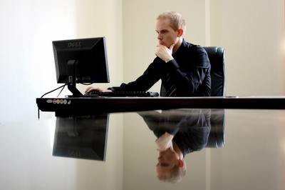 Oracle vs SAP - man at computer